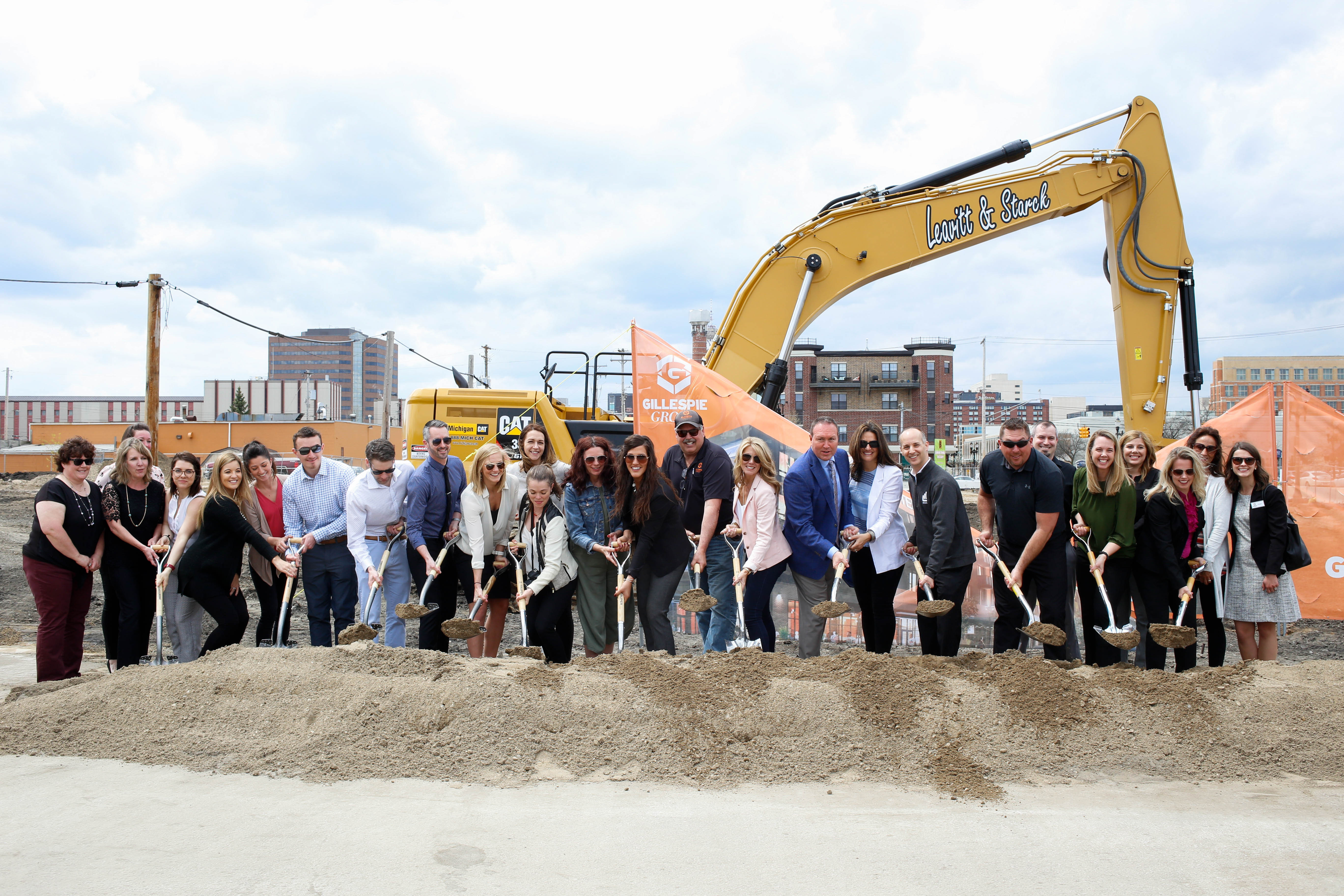 Picture of the Gillespie Group team at the groundbreaking with shovels in the dirt