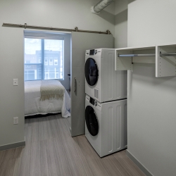 View of one bedroom in-unit washer and dryer