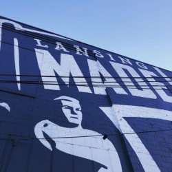 A mural on the outside of the Lansing Brewing Company building says "Lansing Made."
